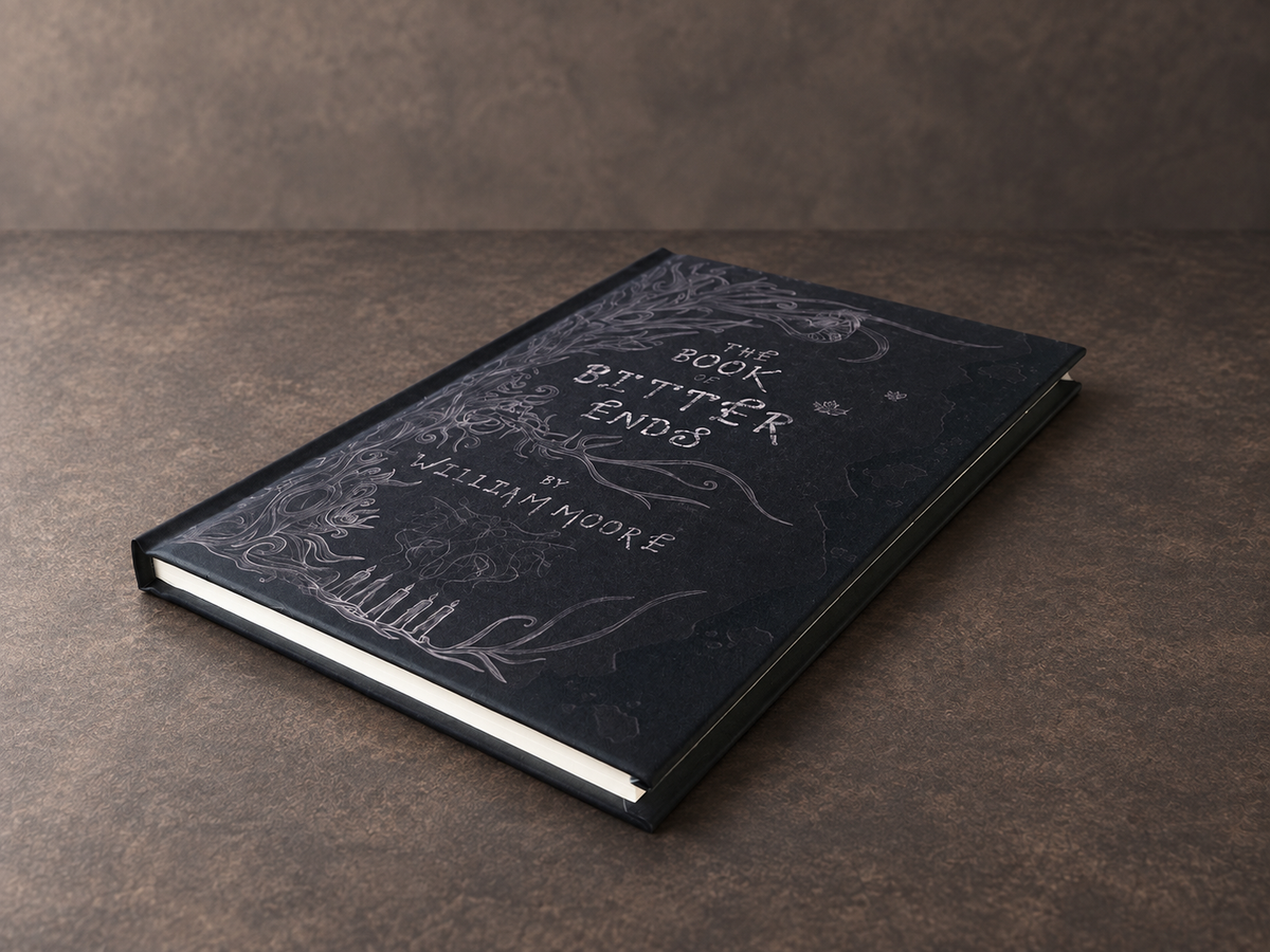 The Book of Bitter Ends hardback, angled view showing the cover and page edges.